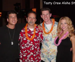 The Tasty crew in Hawaiian shirts and leis at an aloha-themed mitzvah.
